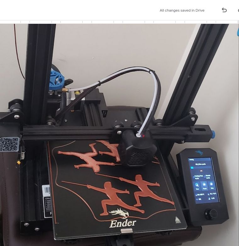 An Ender 3D printer partway through printing a batch of fencer figurines