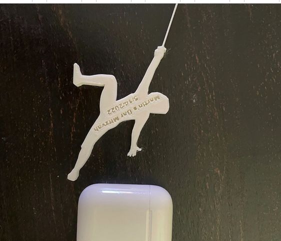 White test print of a fencer figurine